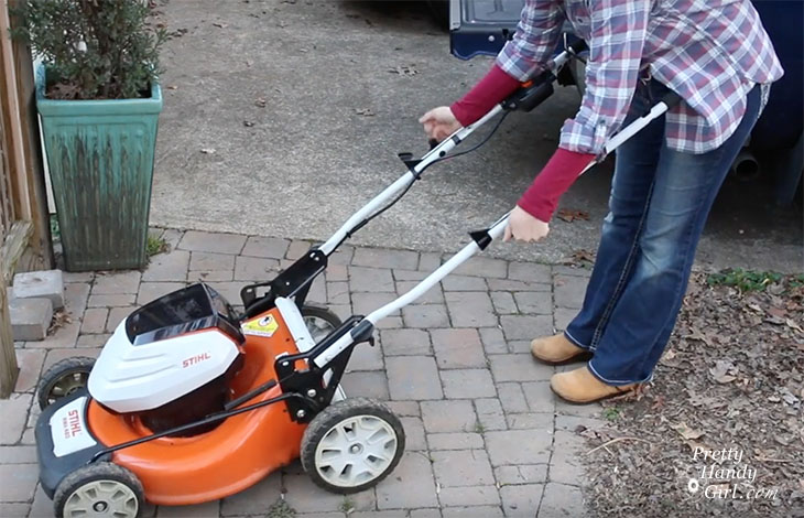 folding down mower handles