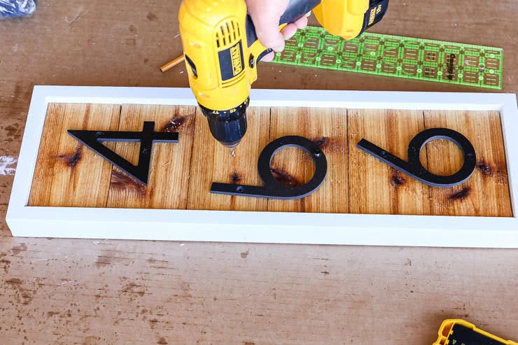pre-drill holes of house numbers