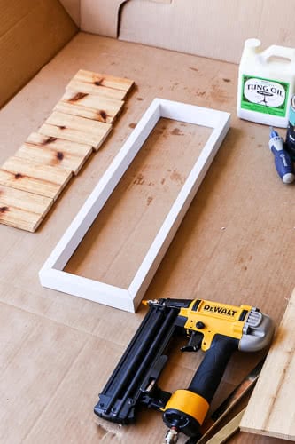 white wood frame for house numbers
