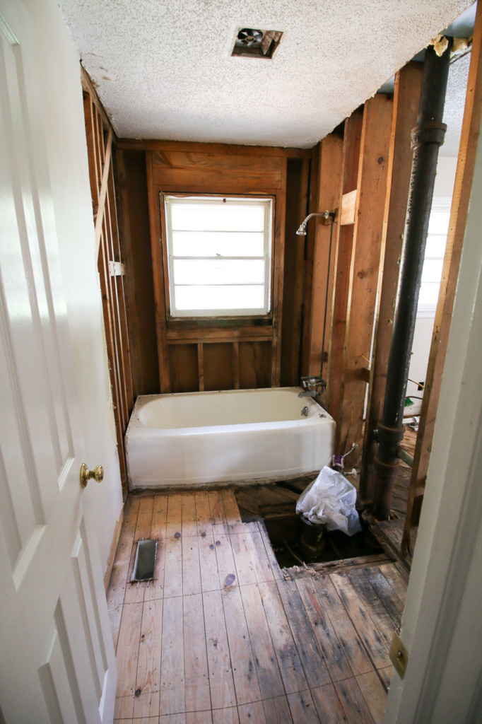 gutted demo bathroom
