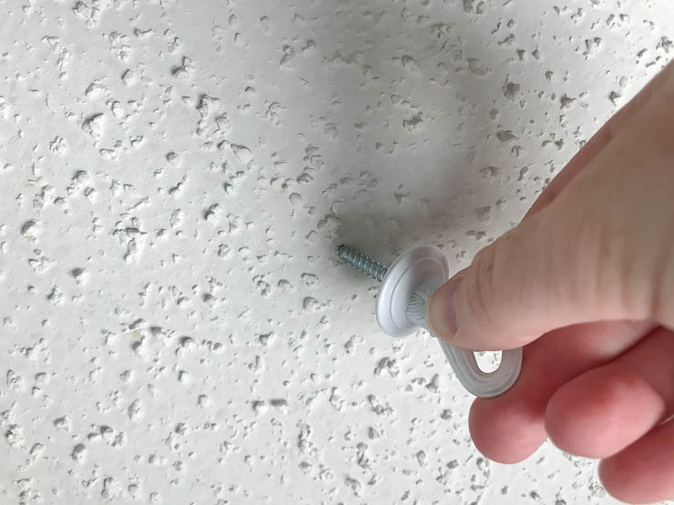 Installing ceiling hook into joist