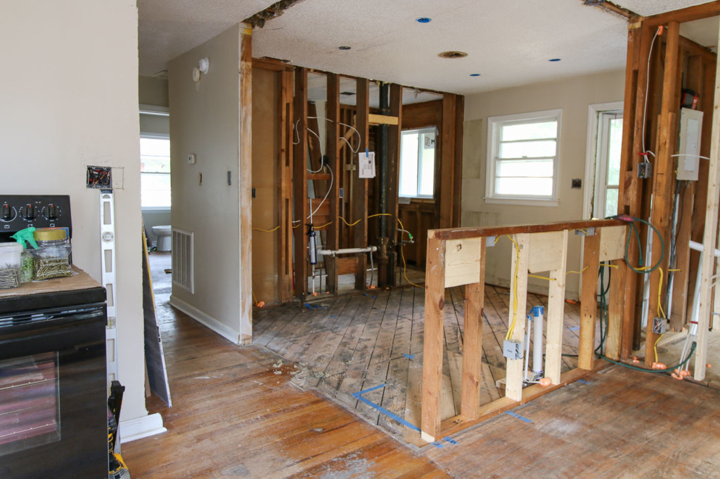 view into kitchen showing half wall for bar top