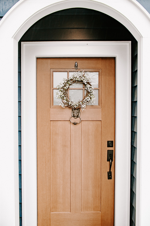 Spring wreath hanging on front door
