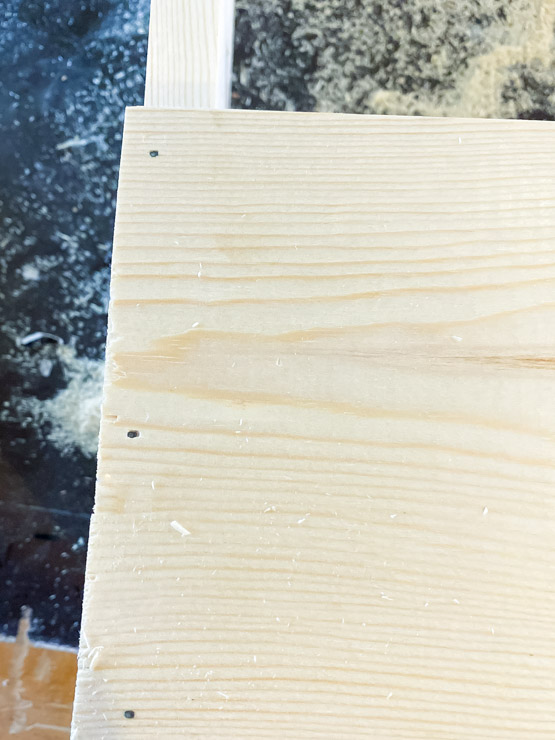 Fill in nail holes and imperfections with wood filler