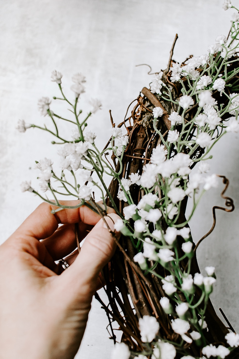 insert florals into grapevine wreath