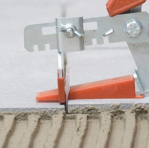 wedge shaped tile spacer leveling two tiles