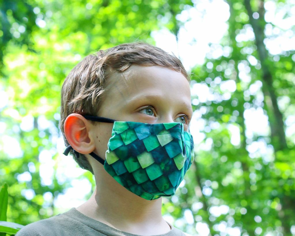 child wearing dragon scale best fit face mask