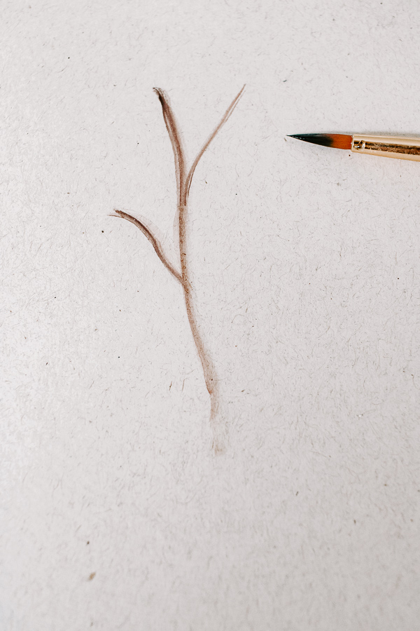 paint a stem using a small watercolor brush