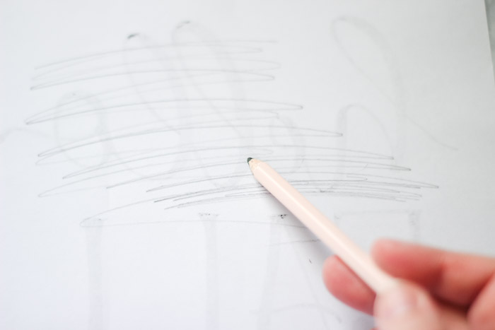 shading over back of design with pencil