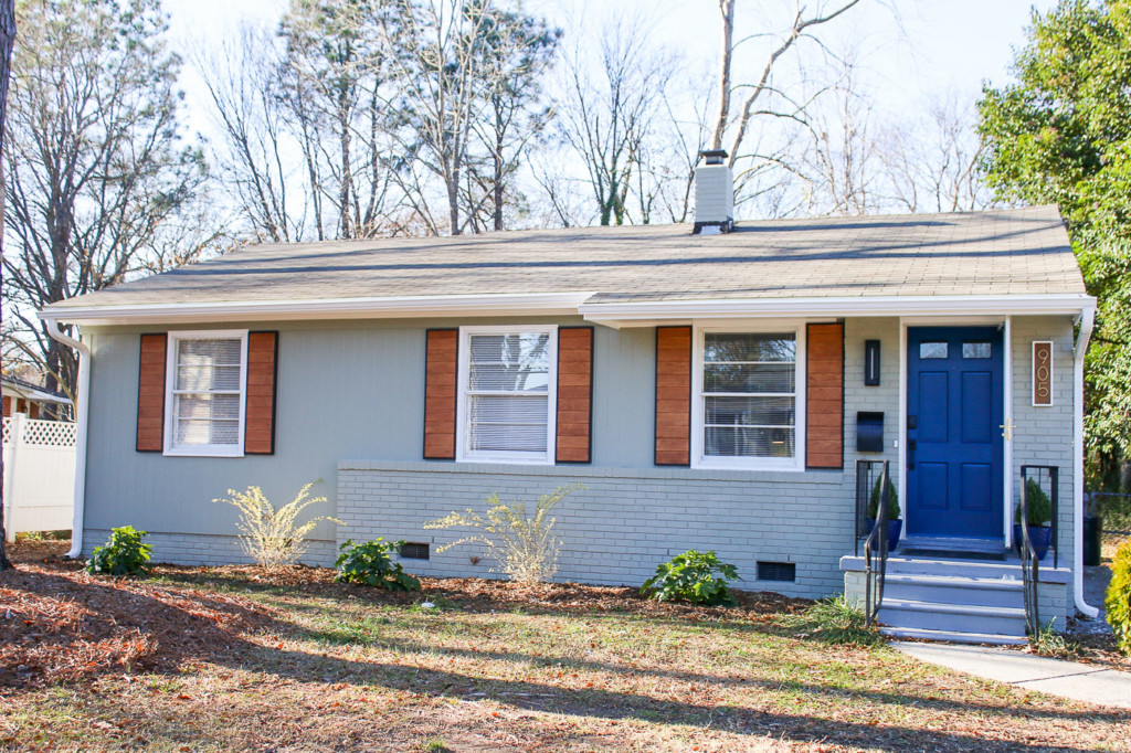 1905's ranch with modern wood shutters
