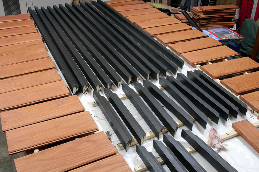 wood shutter pieces after staining