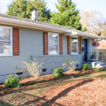 1905's ranch with modern wood shutters