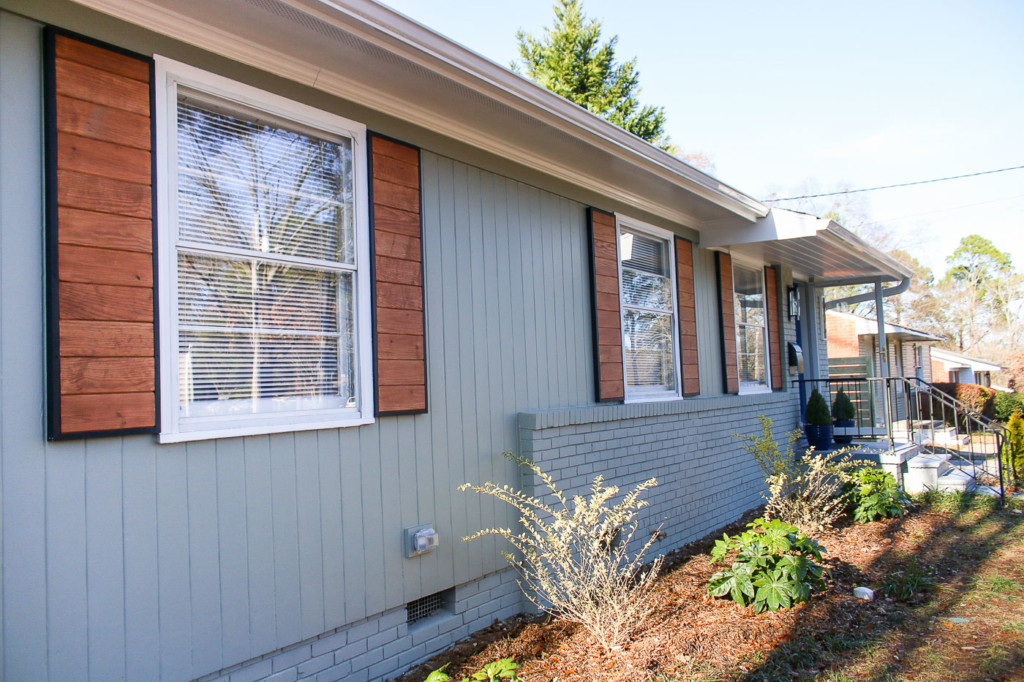 1905's ranch with modern wood shutters