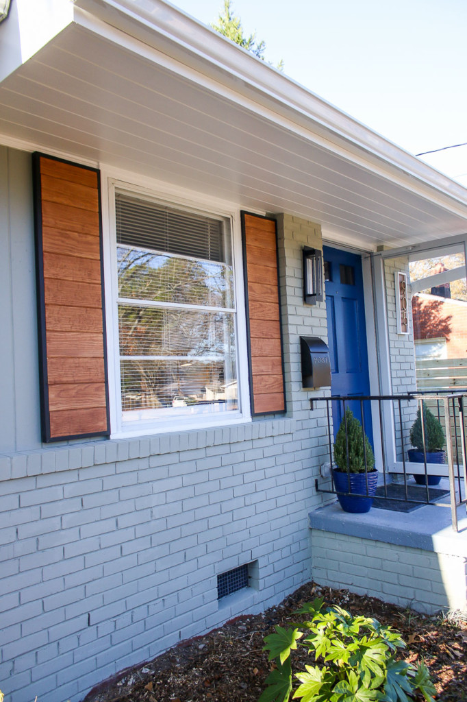 1905's ranch with modern wood shutters
