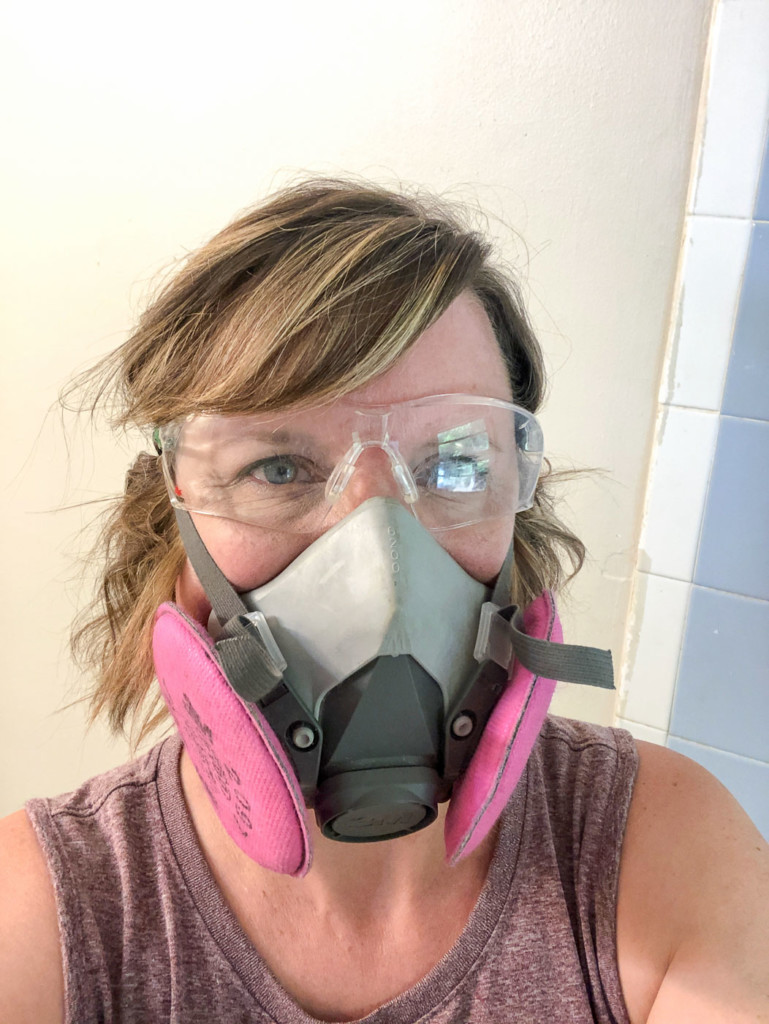 PHG with respirator and safety glasses on