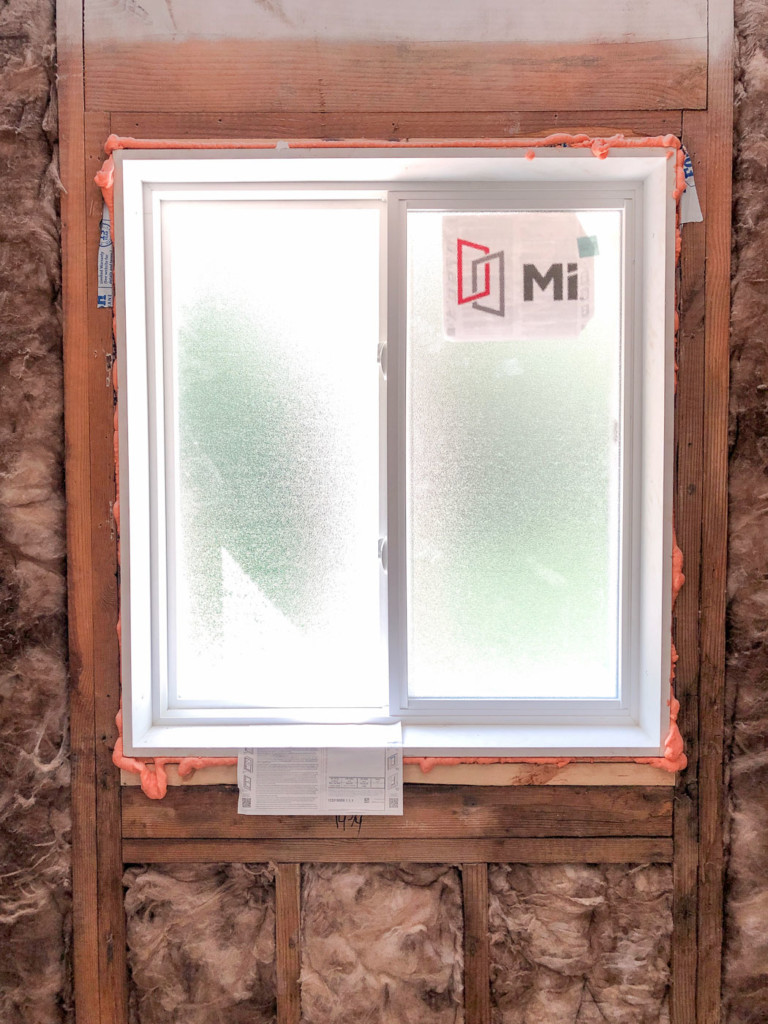 installed new vinyl slider window in shower area