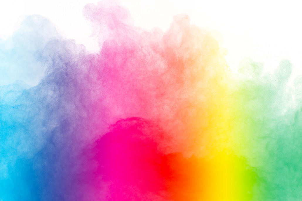 Pretty Handy Girl Explosion of colored powder isolated on white background.