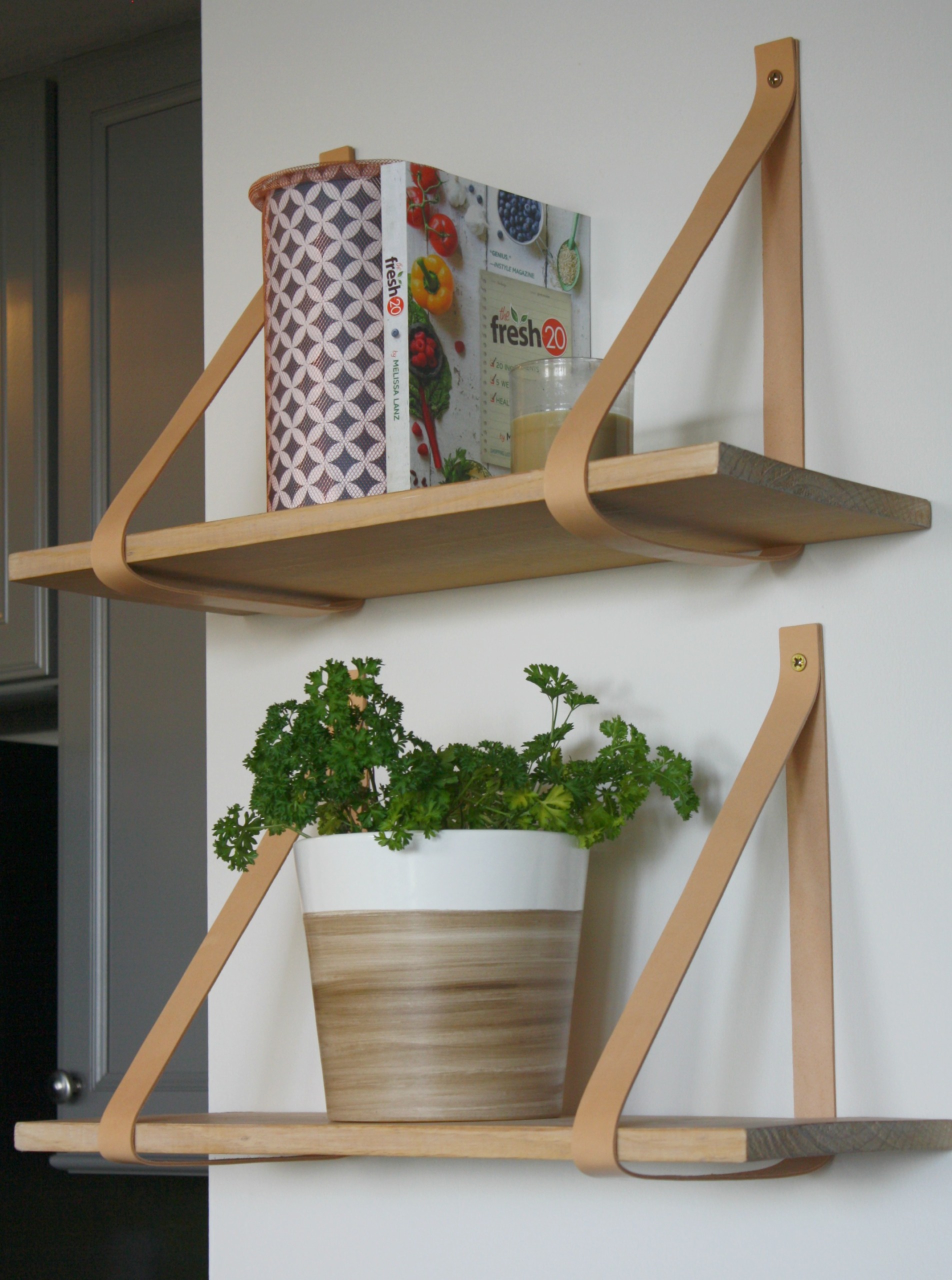 shelves with leather straps