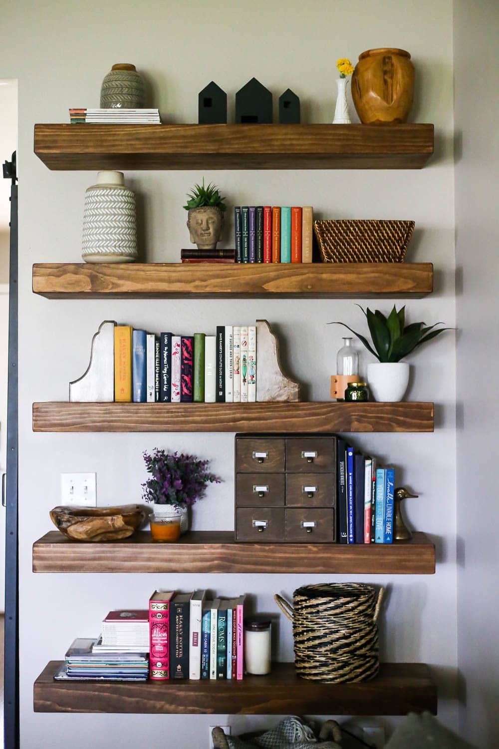 floating shelves with books
