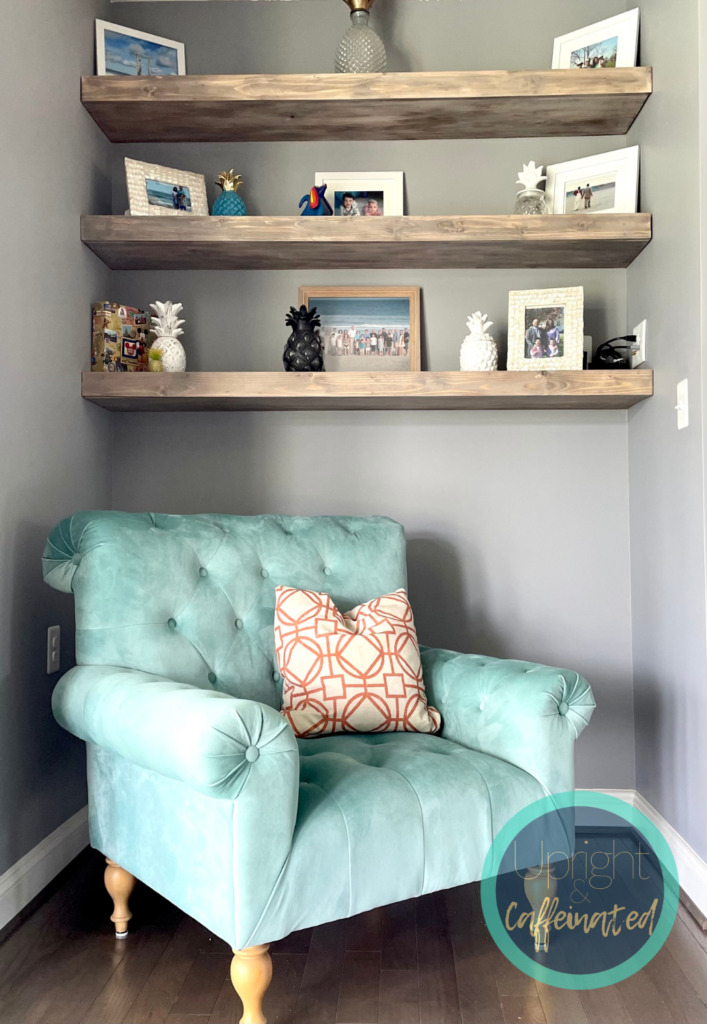 wood shelves with blue chair