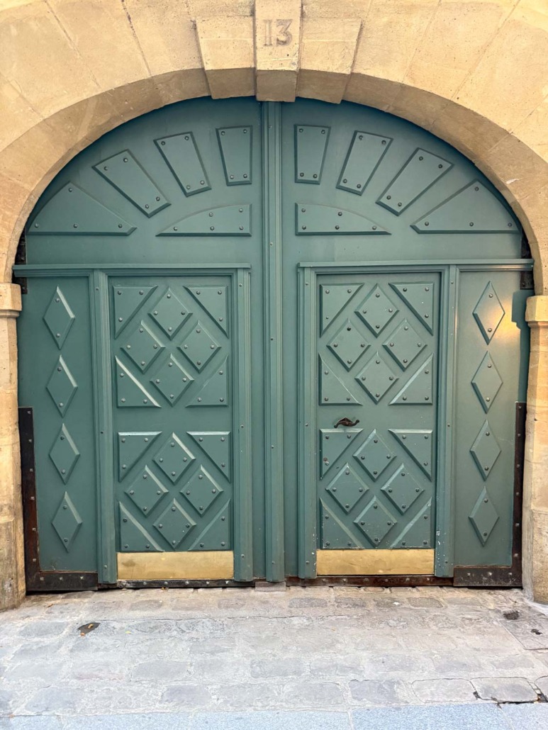 Fort Pierce Green by Benjamin Moore Double wide arched door spotted in France with diamond pattern and sunburst arch